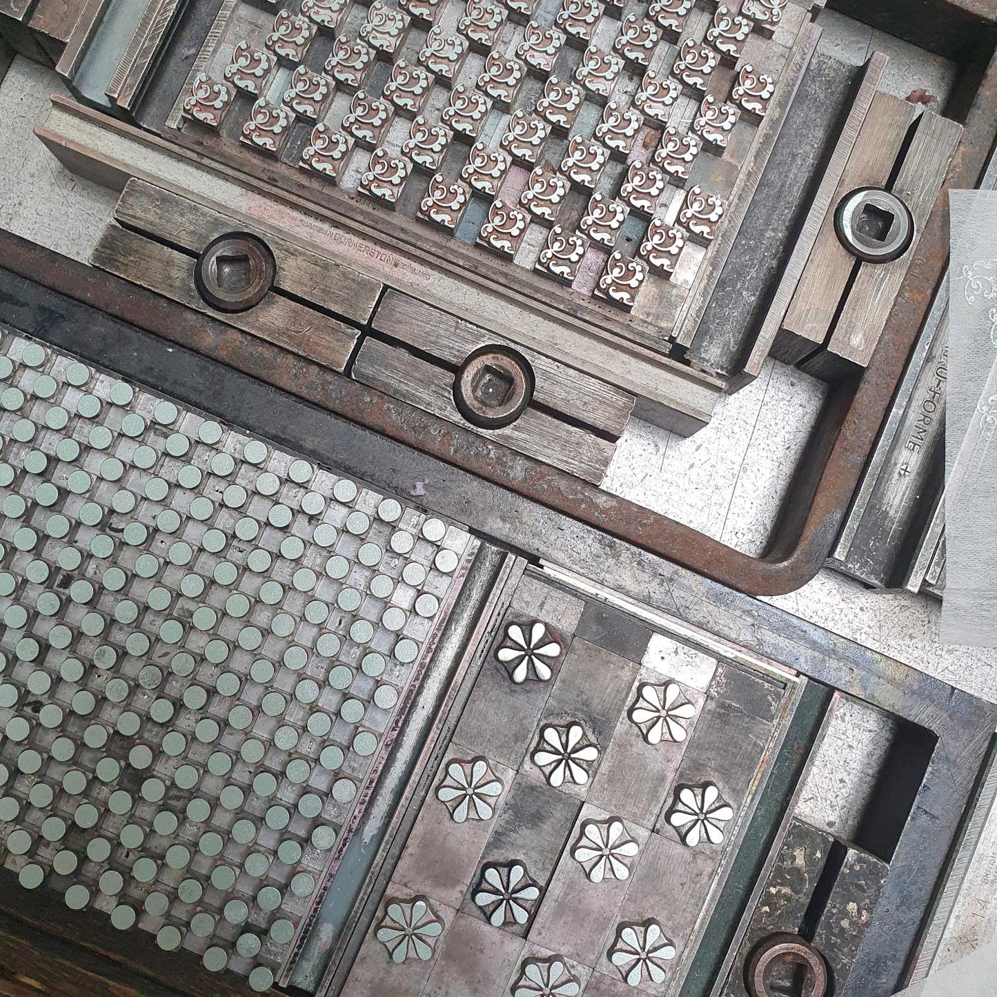 Letterpress type locked up.