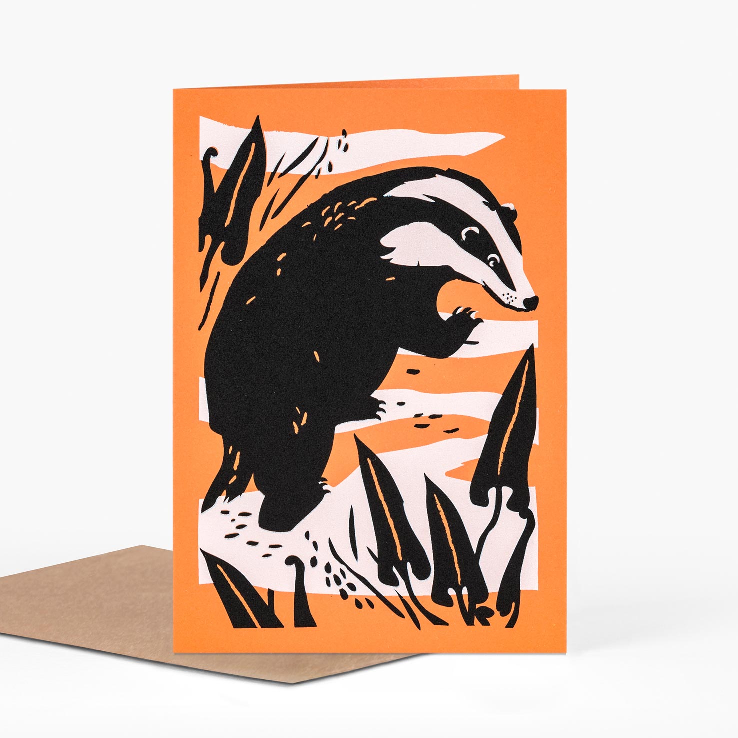 badger screen printed greeting card in orange black and white by pirrip press