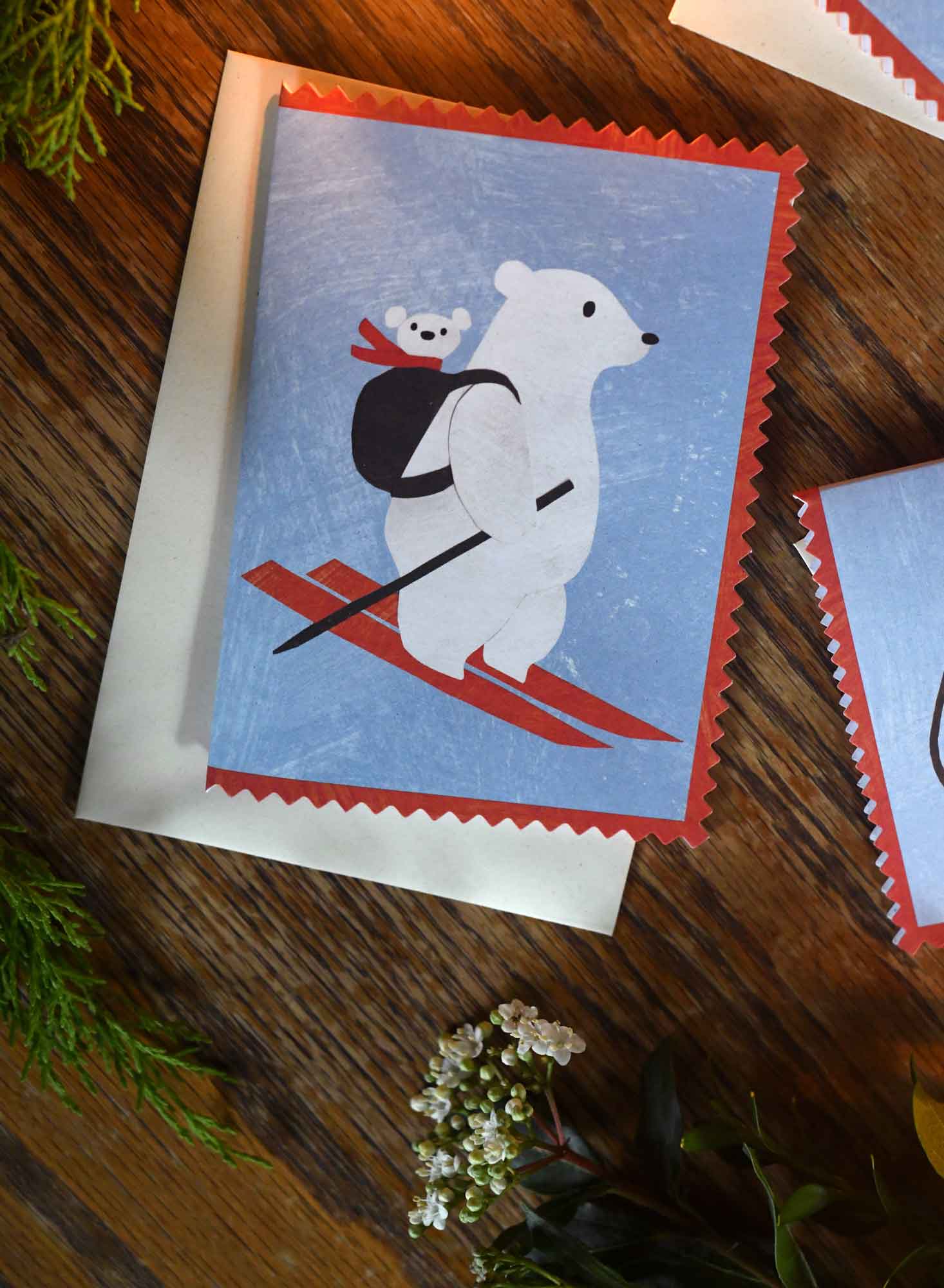 Mummy polar bear and a baby in a backpack christmas holiday greeting card by mortlake papers