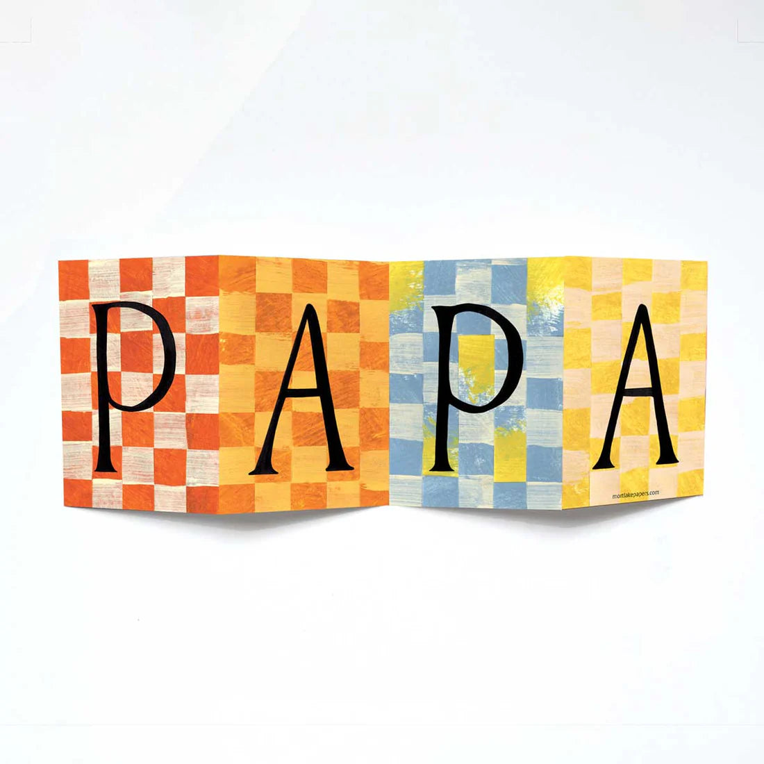 Colorful checkered greeting card by Mortlake Papers with 'PAPA' on a white background.