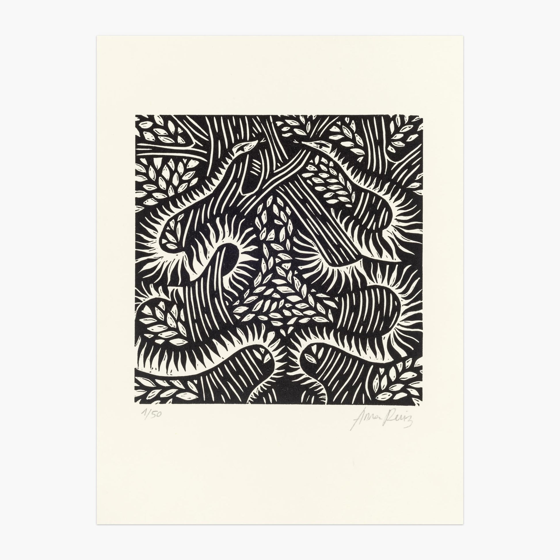 Serpents lino cut print by Anna Ruiz in black ink on off white paper of two snakes curled around tree branches with leaves.
