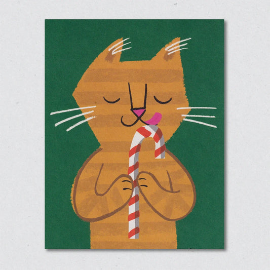 Candy Cane Cat Christmas Card by Lisa Jones Studio Illustration of a gingerbread cat holding a striped candy cane against a green background.