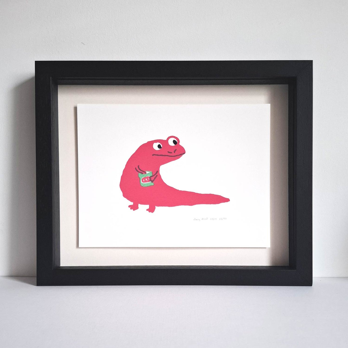 Newt with crisps, salt and vinegar crisps, original art screen print by Daisy Hirst in pink on white, framed in black box frame