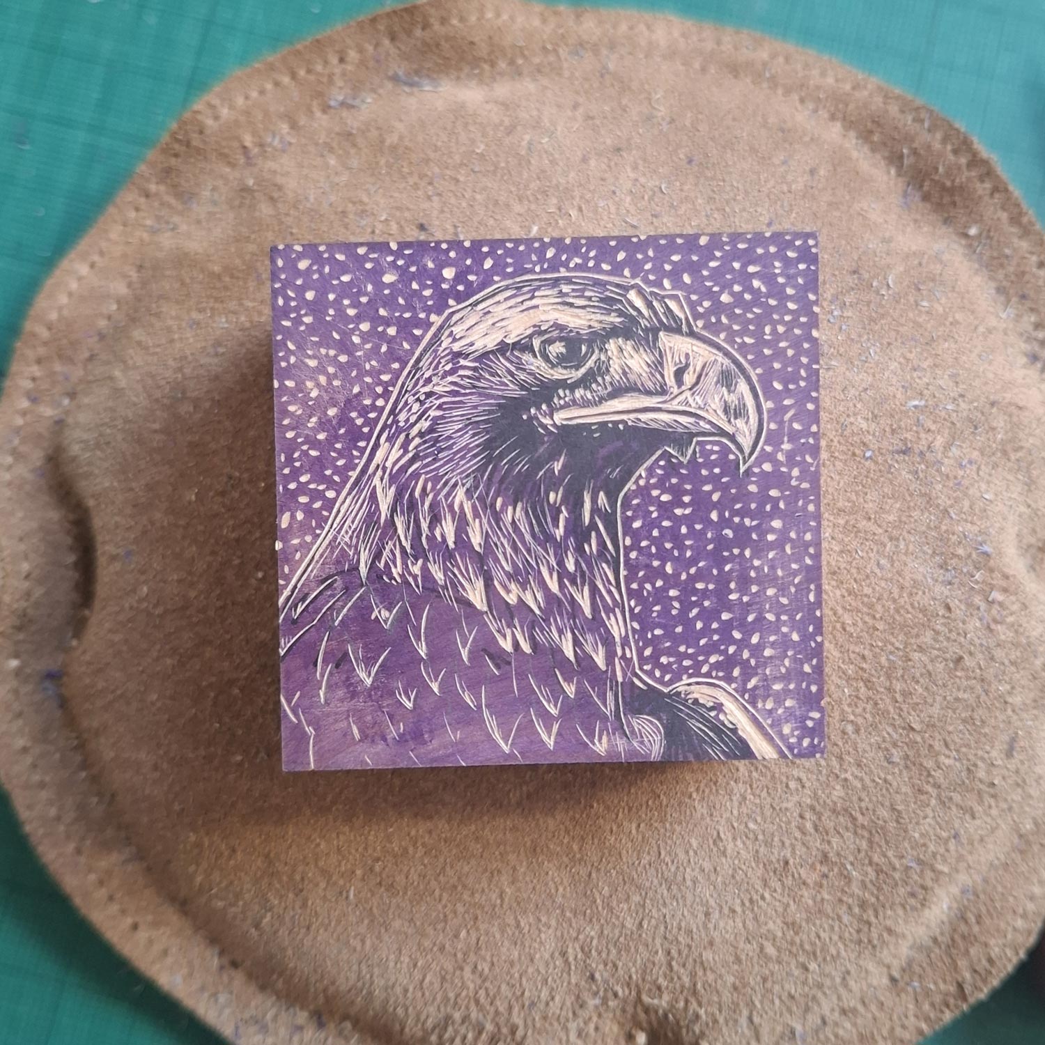 Golden eagle head wood engraving block by contemporary printmaker and artist, Fiona Hamilton.