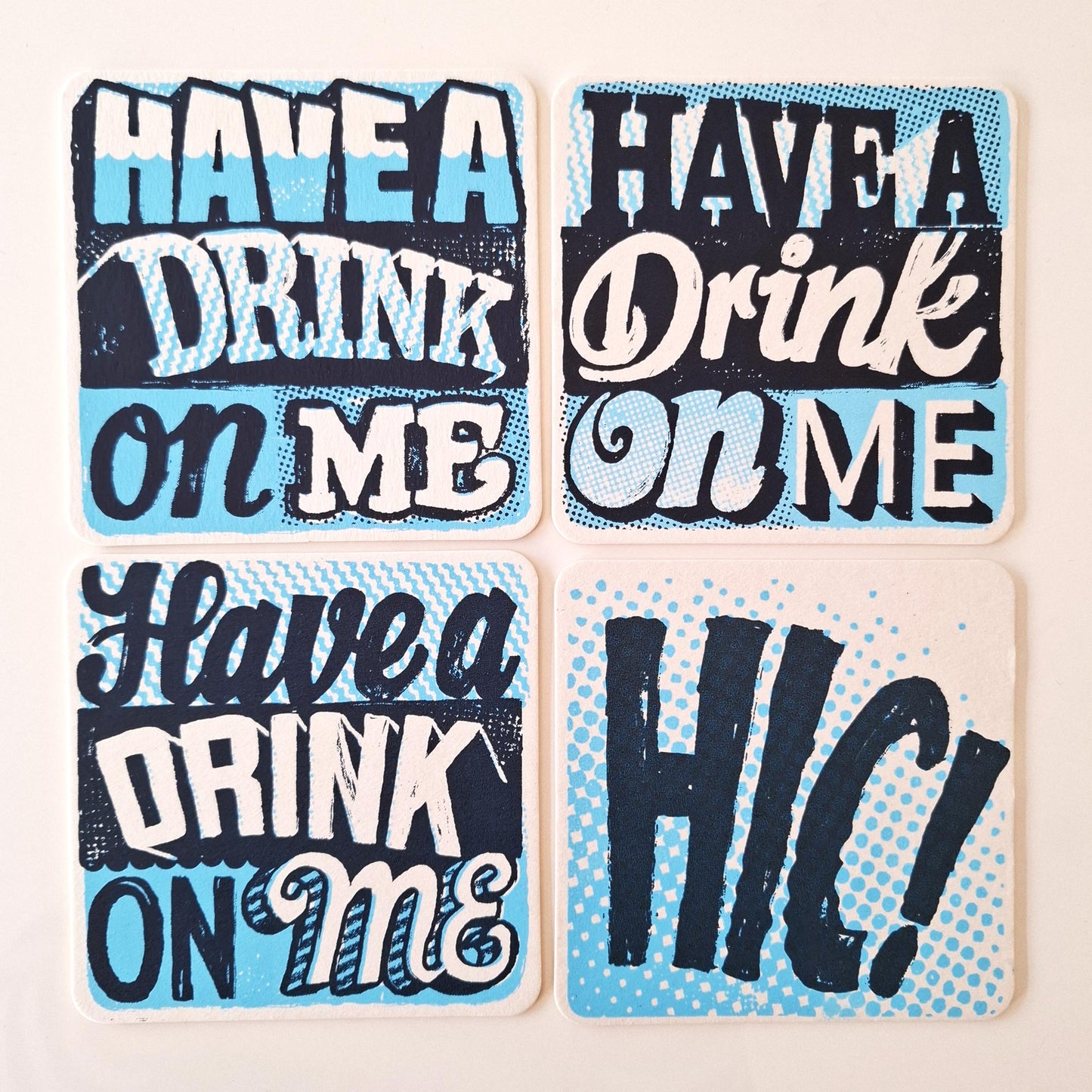 Have a drink on me hic! beermat set of screen printed coasters hand printed by Andy Smith in blue and white and packaged in kraft brown envelope