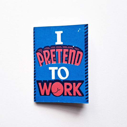 Mini book zine by Andy Smith with title I Pretend to Work in blue and red