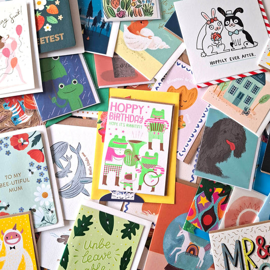 Collection of various greeting cards with different designs and messages.