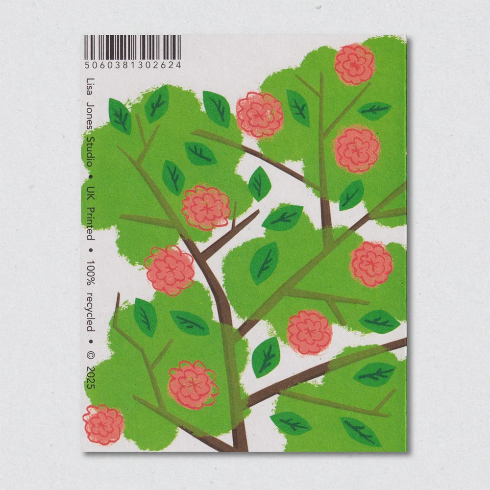 Back of a greeting card with a tree design, featuring pink flowers and green leaves by Lisa Jones Studio.