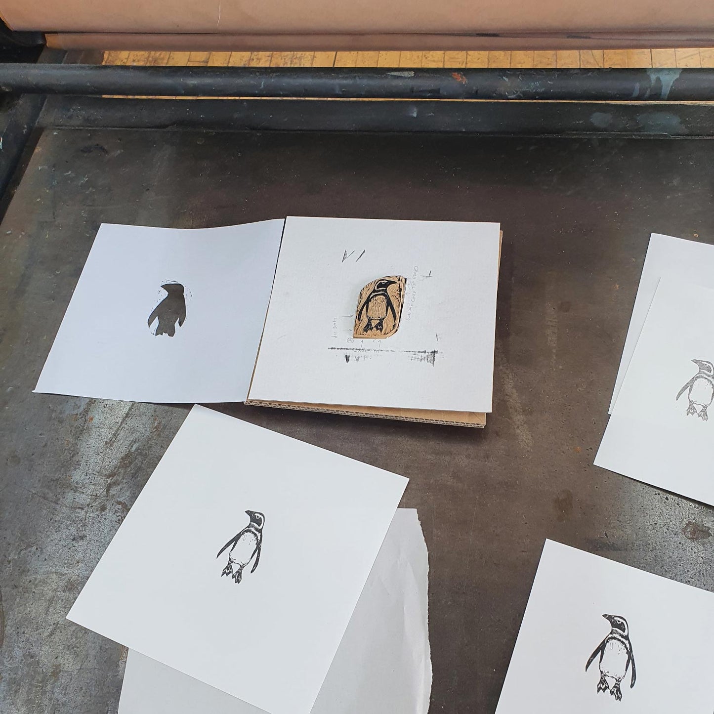 Penguin miniature wood engraving print by printmaker Fiona Hamilton.