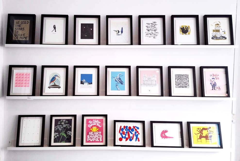 The Soma Gallery 20 year edition of prints framed and on shelves at Frankenstein Press during the pop up.