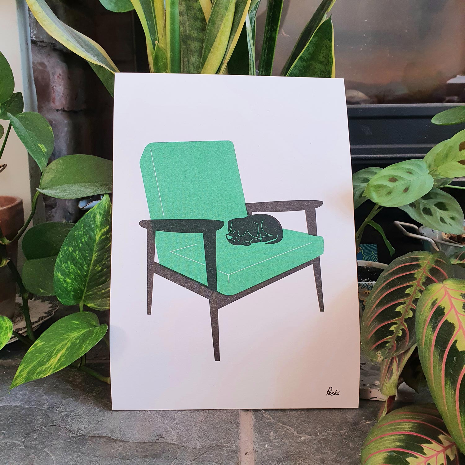 Puppy nap Armchair green riso print by Peski Studio.