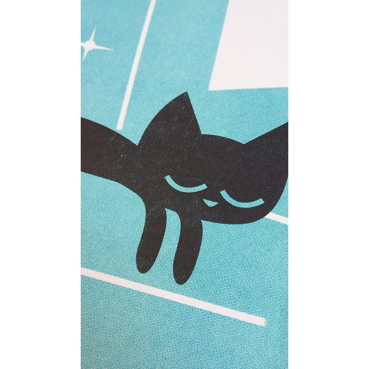 Cat Nat a3 risograph print by Peski Studio featuring a black catnon a turquoise Armchair.
