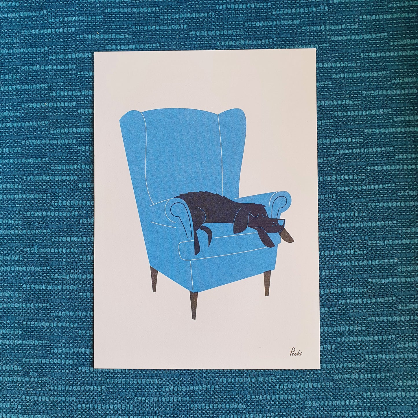 Dog nap Armchair risograph print by Peski Studio.