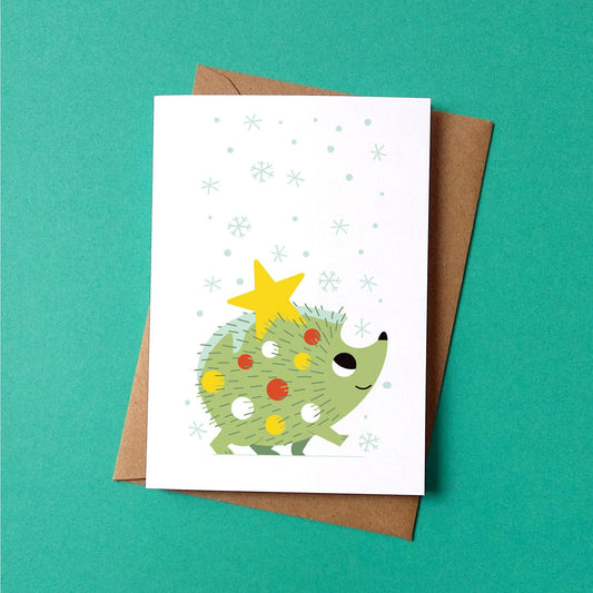 Festive hedgehog Christmas card by Peski Studio.