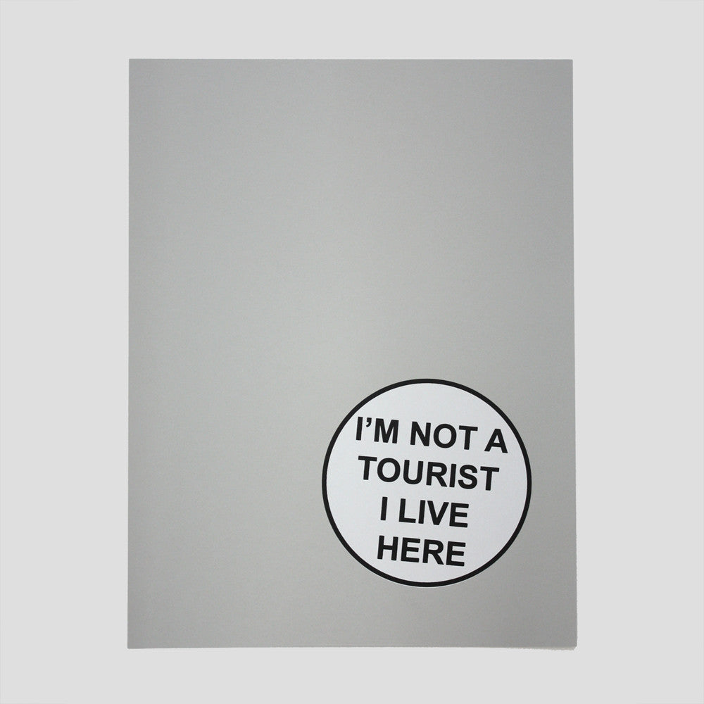 The tourist screen print by Adam Bridgland and Lucy Gough with text I'm not a tourist I live here.