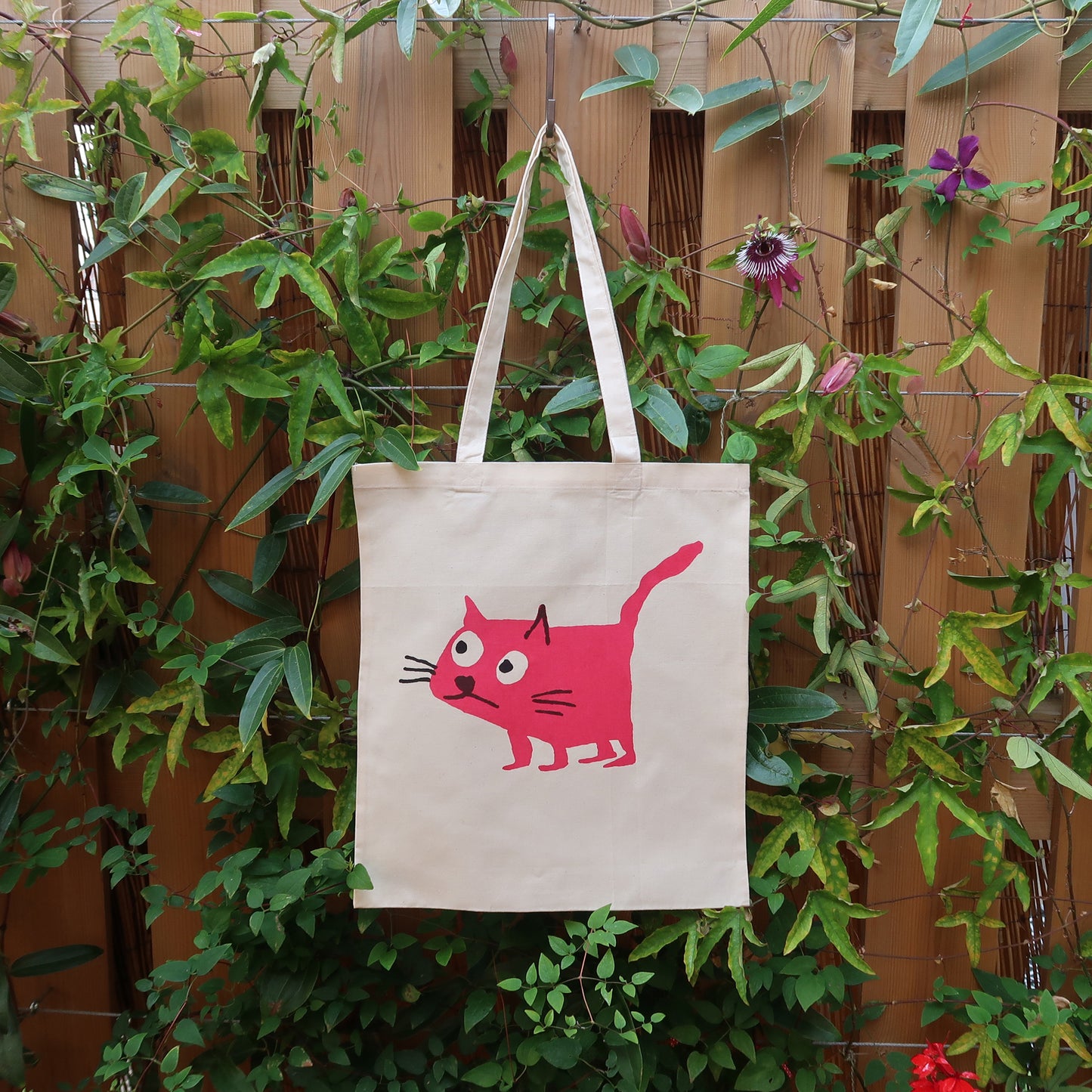 Cat pink tote bag screen printed onto cotton from a collaboration between Daisy Hirst and Soma Gallery.