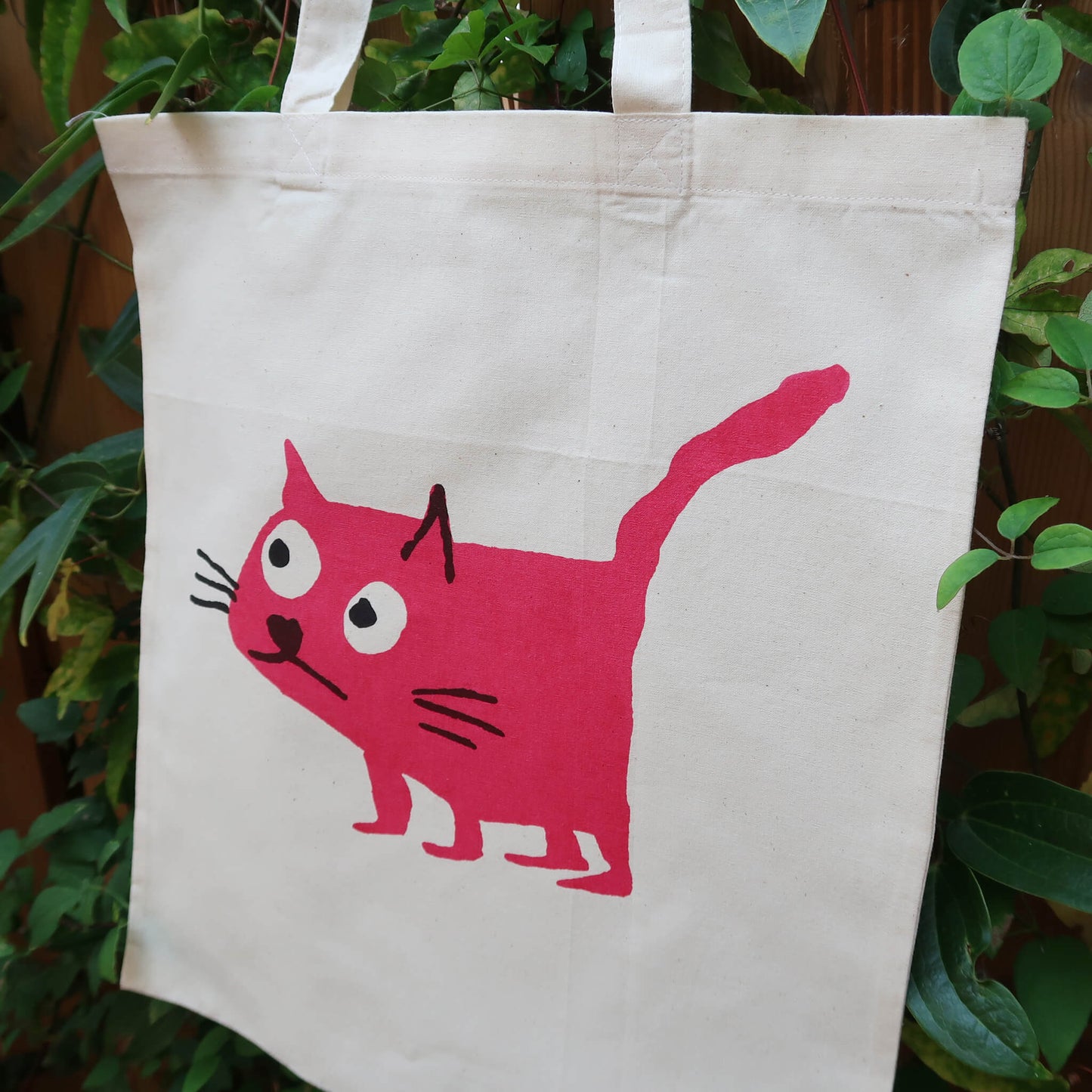 Cat pink tote bag screen printed onto cotton from a collaboration between Daisy Hirst and Soma Gallery.