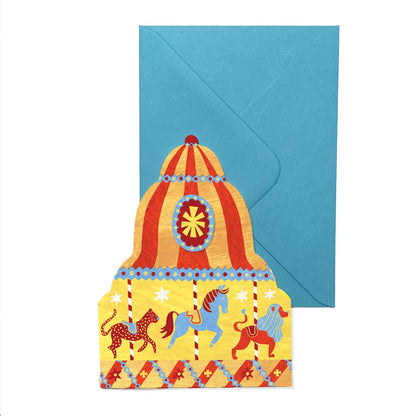 Carousel greeting card by Alice Lickens featuring a greeting card in a fairground carousel style in orange and red with a horse, a lion and a leopard on a white background with a blue envelope.