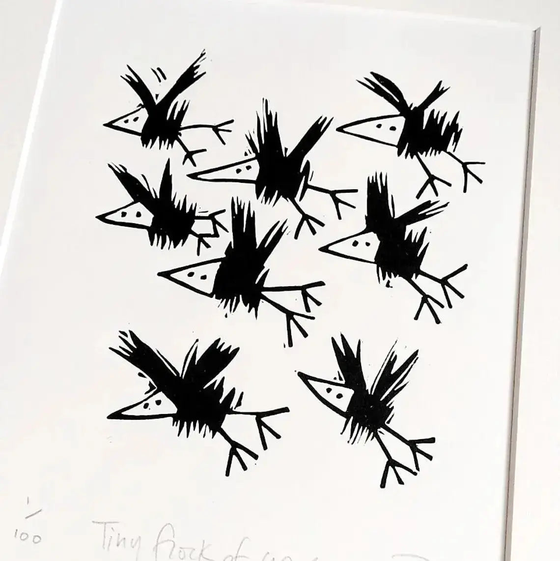 Black lino cut print of crow birds on a white background by Printmaker Melanie Wickham.