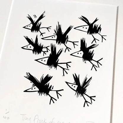 Black lino cut print of crow birds on a white background by Printmaker Melanie Wickham.