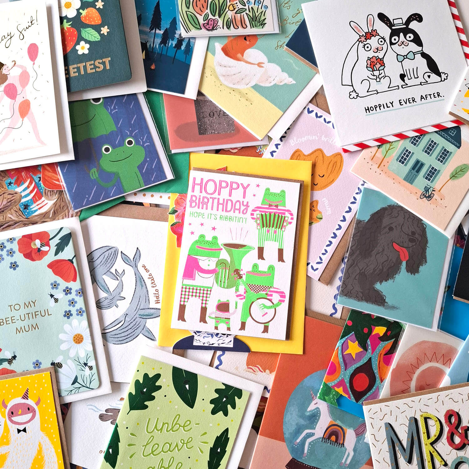 Collection of various greeting cards with different designs and messages.