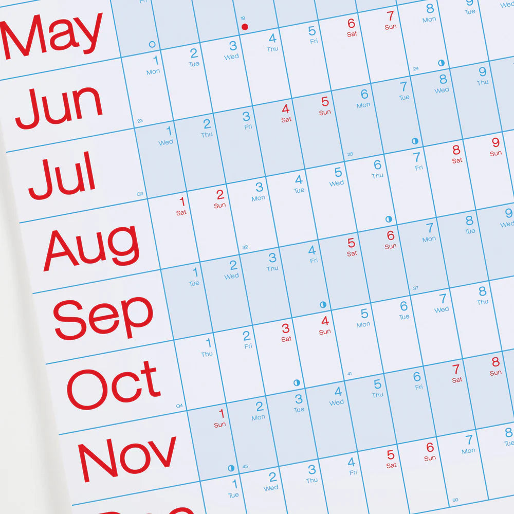 Crispin Finn's Year Planner Calendar for 2026 with red text showing months from January to December on a white and light blue background.
