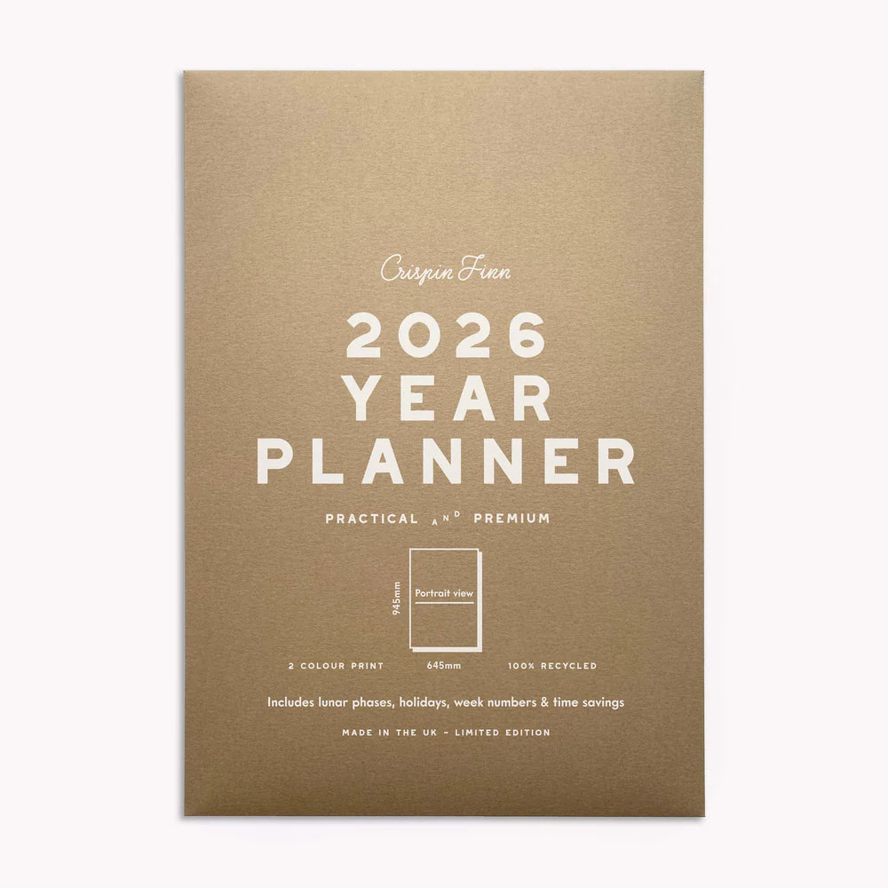 Brown kraft planner envelope packaging with '2026 Year Planner' text screen printed on a white background by Crispin Finn.