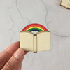'Rainbow Book' brooch by Kate Rowland